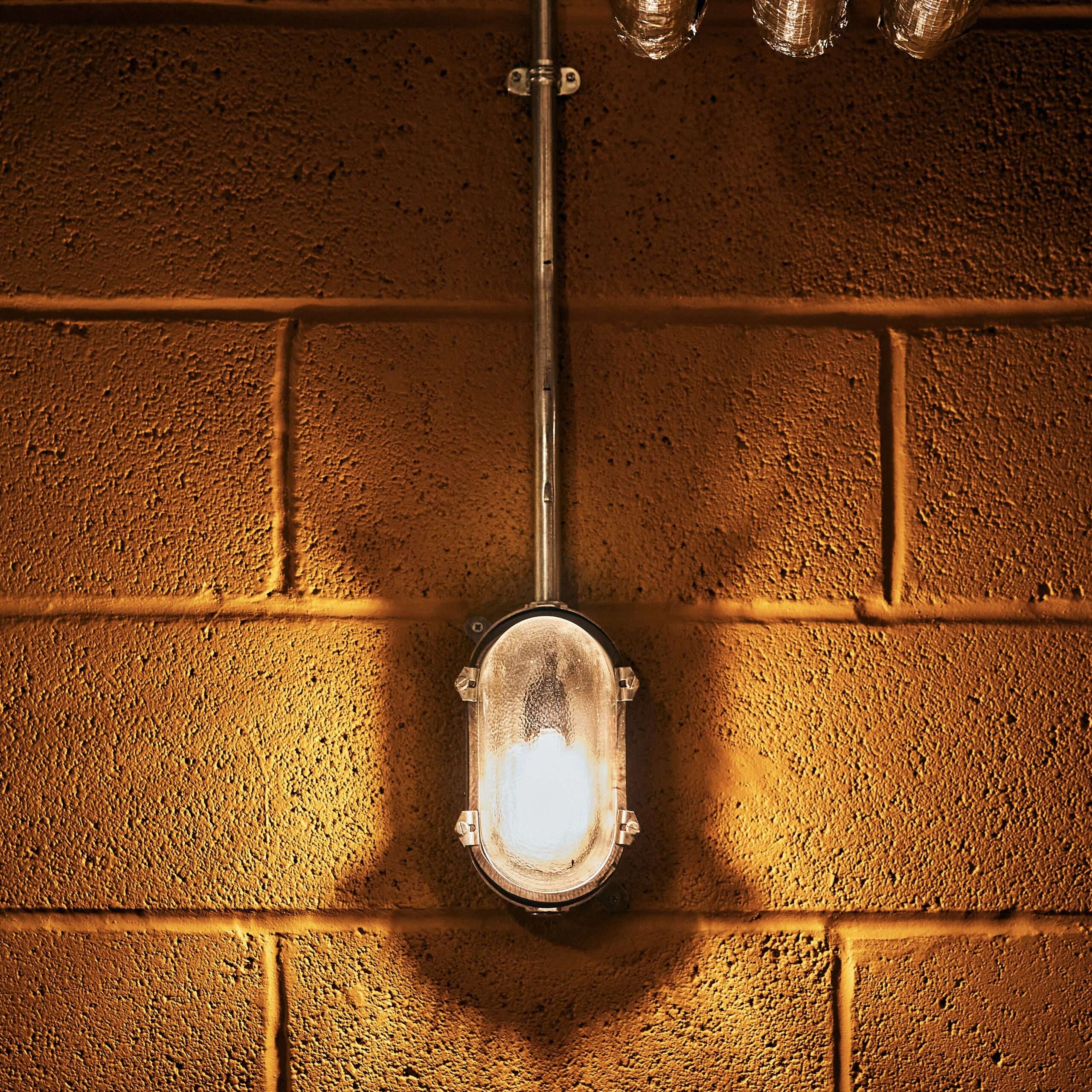 vintage bulkhead light on wall
